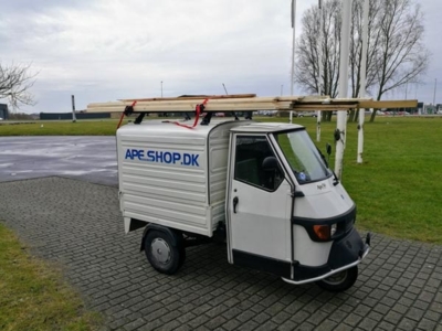 Båndstrammer til tagbøjle